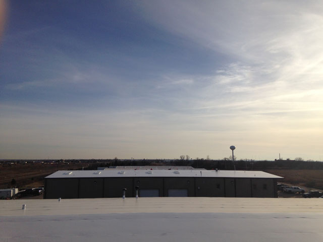 Commercial roofing system replacement for Drill Right Technologies in Moore, OK
