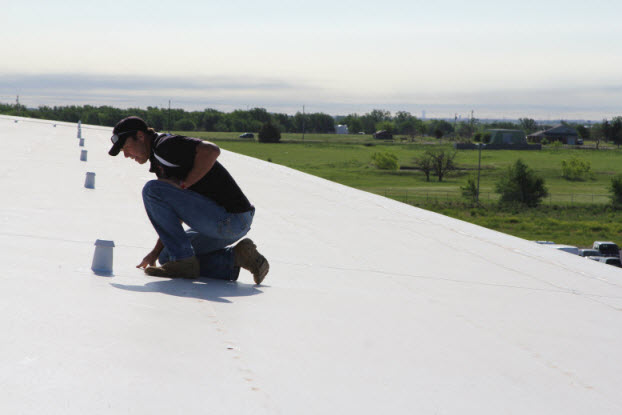 Coryell commercial roofer inspecting finished project