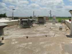 Before image of commercial roofing system project by Coryell