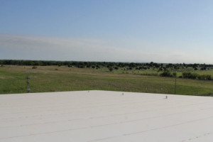 White roofing system by Coryell in Oklahoma countryside