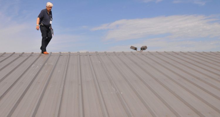 FEMA Inspector On A Roof In Oklahoma